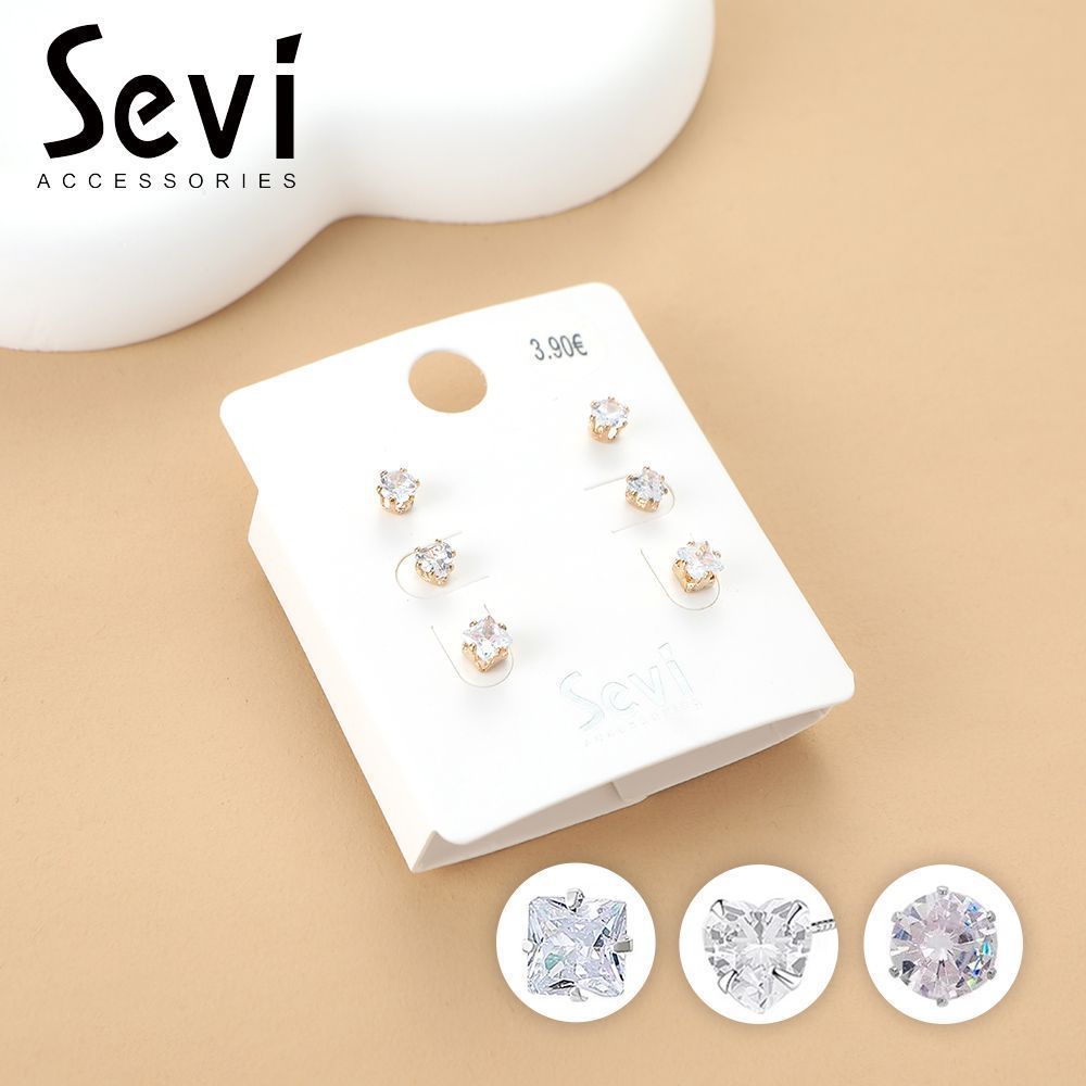 SET DI ORECCHINI CON ZIRCONI E BASE DORATASevi
